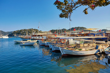 Fototapeta na wymiar Marine parking of boats and yachts in Kekova is a sunken city in Turkey.