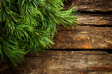 Vintage  Christmas holiday wooden planks rural background. Beautiful Empty Christmas Backdrop.  New Year Background.  Xmas background with pine branches