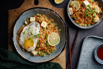 Vegetarian fried rice with tofu, peas and vegetables. Asian cuisine, healthy lunch