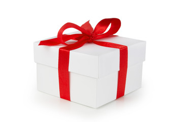 White One gift box with red ribbon bow, isolated on white background