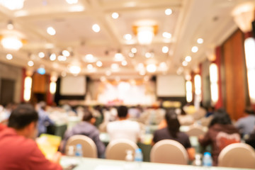 abstract blur of people at meeting room