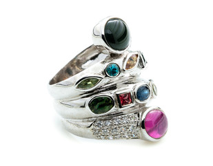 Ring with differet color gemstone on whit background
