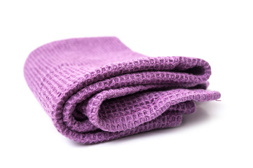 closeup of purple cleaning towel on white background