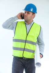 Engineer on white background wearing protective vest