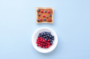 Toast with peanut butter and berries.