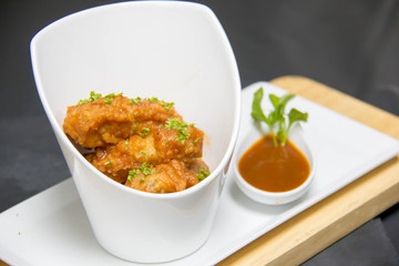 spicy chicken wing with chili sauce