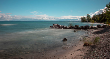 beach and sea, rocks and sky