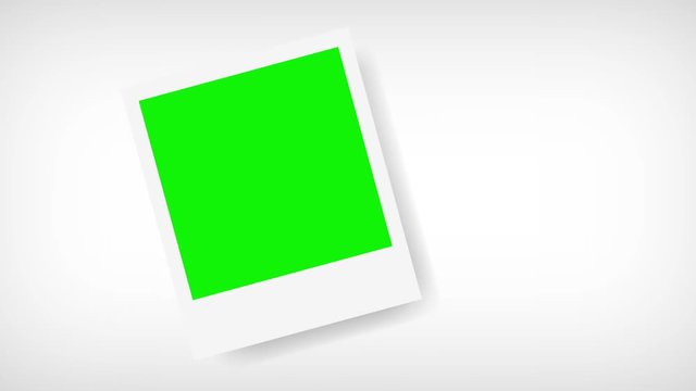 Picture frame with green screen for your photo. White background