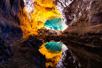 Water optical illusion reflection in Cueva de los Verdes, an amazing lava tube and tourist attraction on Lanzarote island, Spain.