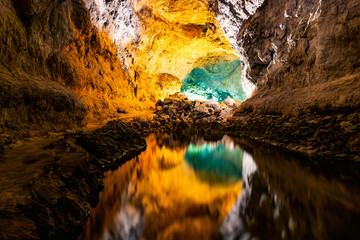 Water optical illusion reflection in Cueva de los Verdes, an amazing lava tube and tourist...