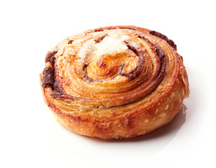 Sweet bun with cinnamon isolated on white