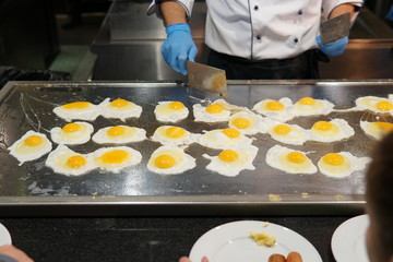 eggs in the kitchen of the restaurant scrambled egg yolk protein for breakfast