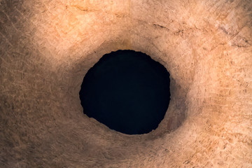 A black hole in a rock crevice. Abstraction
