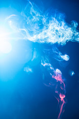 Fototapeta na wymiar blur blue smoke abstract texture background and light glowing .