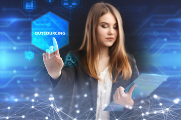The concept of business, technology, the Internet and the network. A young entrepreneur working on...