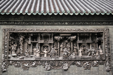 Stone relief showing a historic chinese  traditional lifestyle scene at Chen Clan Ancestral Hall in Guangzhou, China, Asia