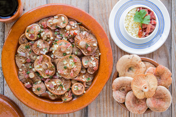 Fresh and cooked saffron milk cap mushrooms