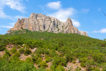 mountain landscape, a mountain with a Grand stone ridge on top