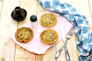 homemade algerian recipe Mini meat pies  on a wooden table