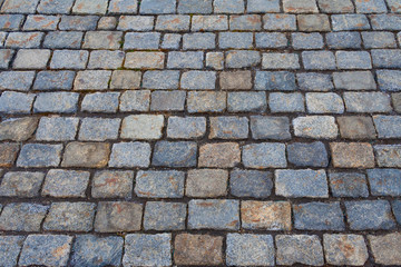 Perspective view on a old stone pavement (background)