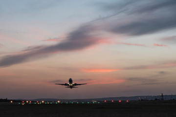 Take-off plane in the evening from the airport.