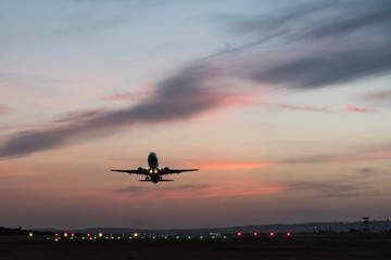 Take-off plane in the evening from the airport.