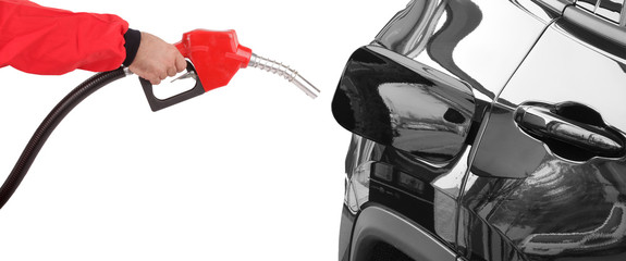 Gasoline pistol pump gun fuel nozzle and car on gas station