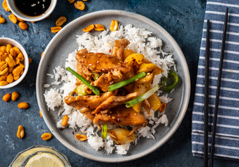Kung Pao chicken, stir-fried Chinese sichuan traditional sichuan  dish with chicken, peanuts, vegetables and chili peppers.