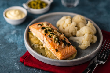 Solomon fillet with pineapple and cauliflower. Fish with vegetables.