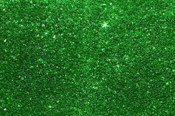 Green glitter lights grunge background, glitter defocused abstract Twinkly Lights and Stars Christmas Background.