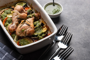 Ratatouille with chicken and pesto. French cuisine. Rosemary chicken with oven-roasted ratatouille.