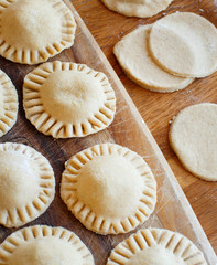 Making ravioli with ricotta cheese and spinach