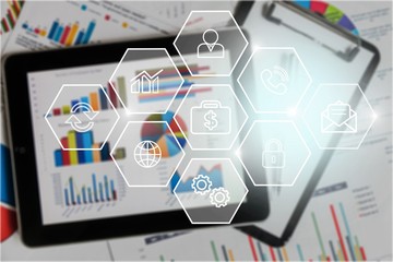 Digital tablet with pen on table in office