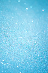 Obraz premium Glitter paper background. Festive sparkle texture. Decorative element for party, birthday, New Year design