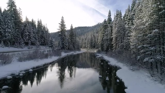 4K clip flying over the trucker river near Lake Tahoe after a heavy snow storm