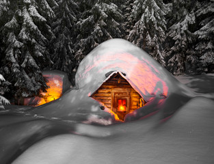 fairy-tale snow-covered house in the mountains