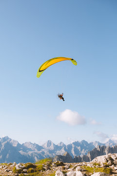 Paragliding over a field