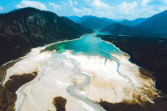 River surrounded by mountain ranges