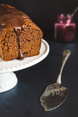 Homemade gingerbread cake on white plate. Honey cake.