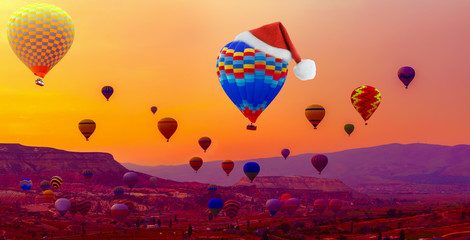 Santa Claus red hat on Hot air balloon