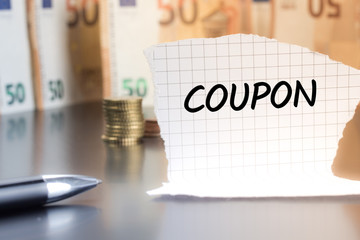 Coupon schriftlich auf einem Notizzettel