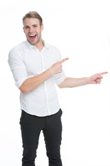 Manager or assistant help find direction. Pointing direction. Man shop assistant pointing index finger isolated on white. Guy handsome shows direction. Look at this advertisement. This way concept