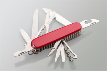 Multi-Tasking metal Penknife isolated on white