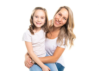 A mother and daughter portrait isolated on white studio.