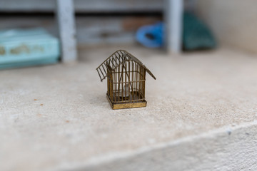 tiny metallic bird cage