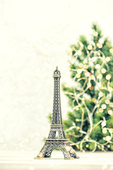 Fototapeta na wymiar Eiffel Tower Christmas tree decoration golden lights Paris France