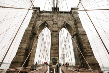 The Brooklyn bridge, New York City, USA. Rainy day in New York.