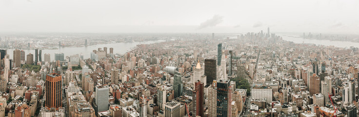Fototapeta premium Panorama view of Manhattan New York City Skyline Buildings. Rainy day in New York.