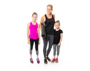 Fototapeta premium A Proud to be strong and healthy. Happy sporty family on studio white background