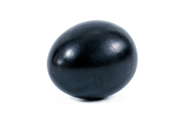 Grape isolated on white background. One berry. Dark grape. Blue grape.